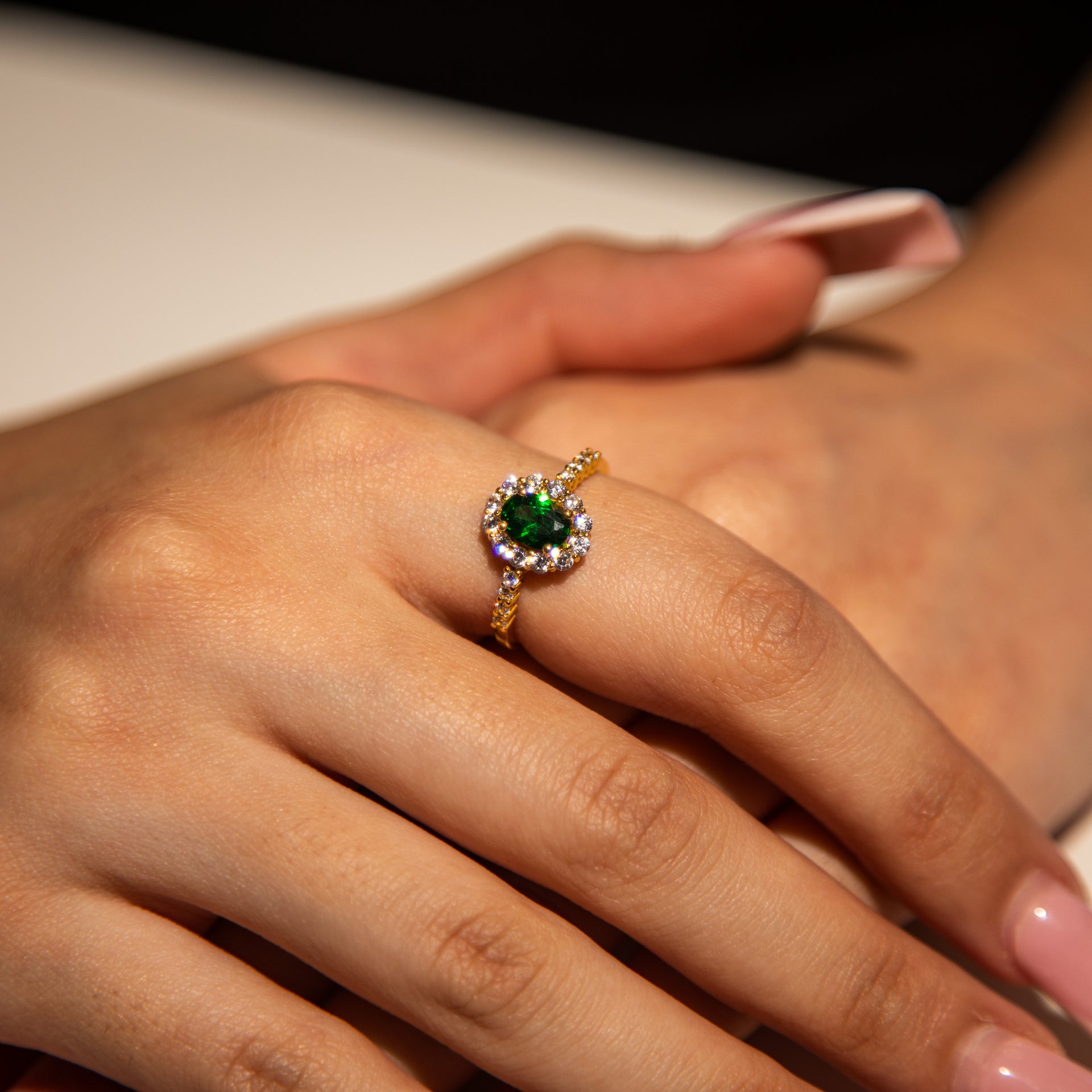3g 22ct Gold Green Oval Gem with Clear Gem Halo Ring